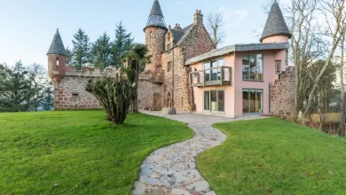Photo of British businessman transformed a derelict castle into a whimsical rental — and painted it pink.