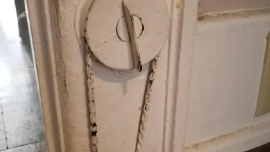 Photo of What is this dial with a chain that goes into the floor of this old house?