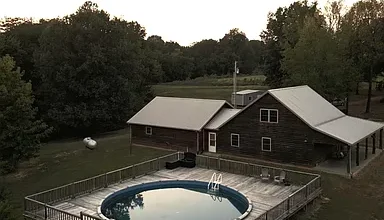 Photo of 16.32 Acres with Log Cabin, Saltwater Pool, and Pond – Fancy Farm KY.