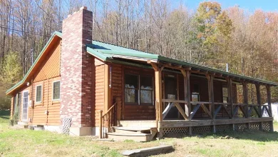 Photo of Rustic Log Home on 17+ Acres with Bonus Mobile Home – $174,950