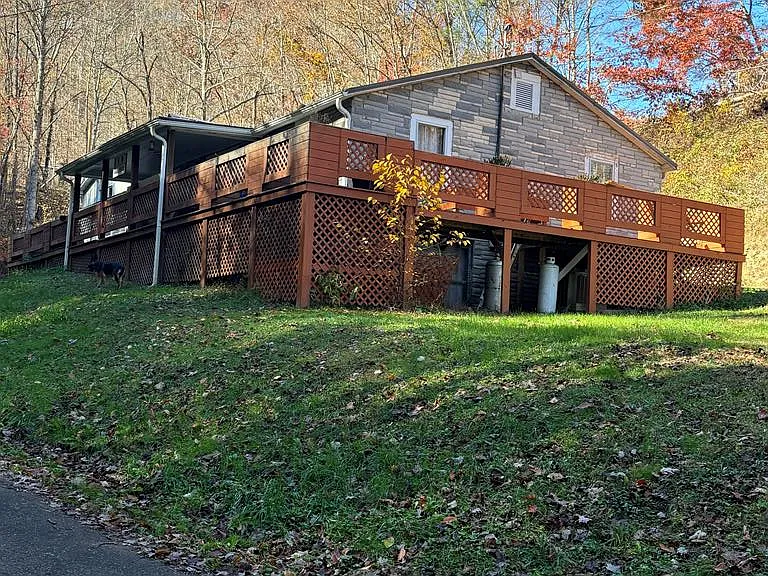 Photo of Century-Old Permastone Home on 22 Acres – $199,500