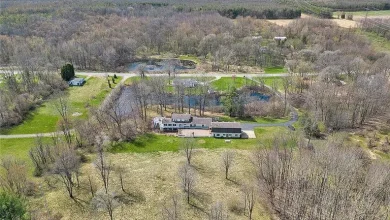 Photo of Spacious 6-Bedroom Estate with Barn, Pond, & Home Theater on 12 Acres – Opening Bid: $250,000